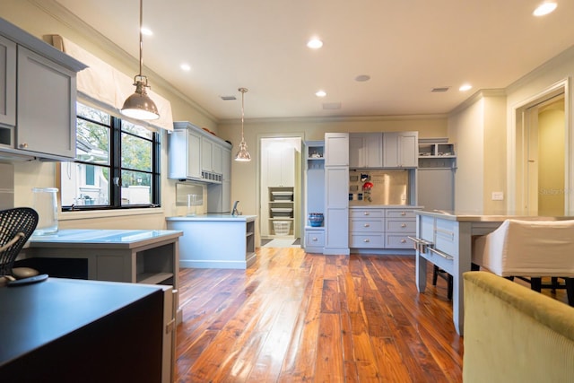 kitchen with ornamental molding, gray cabinets, and open shelves