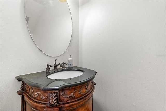 bathroom with visible vents and vanity