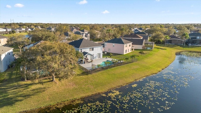 aerial view featuring a water view and a residential view