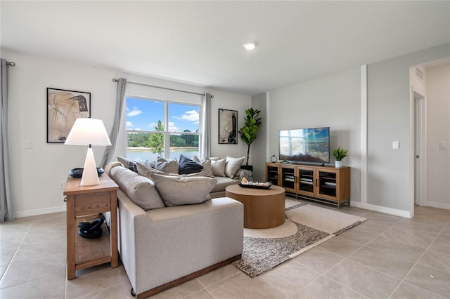 living room featuring light tile patterned floors