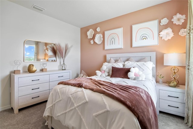 bedroom featuring light colored carpet