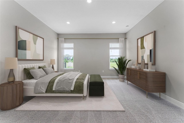 bedroom featuring light colored carpet and multiple windows