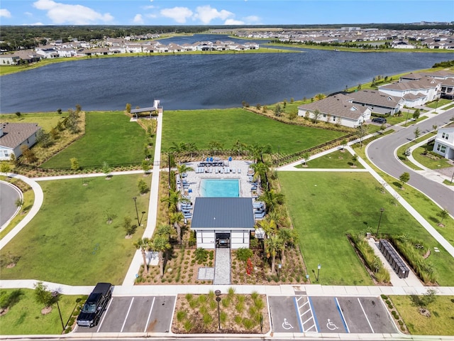 drone / aerial view with a water view