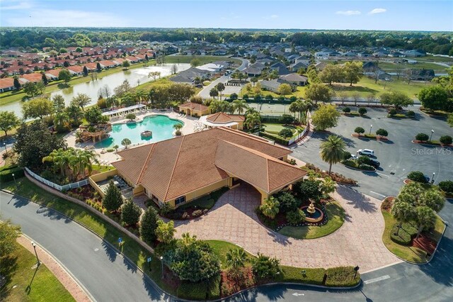 aerial view featuring a water view and a residential view
