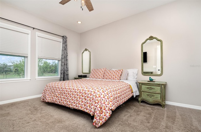 carpeted bedroom featuring recessed lighting, ceiling fan, and baseboards