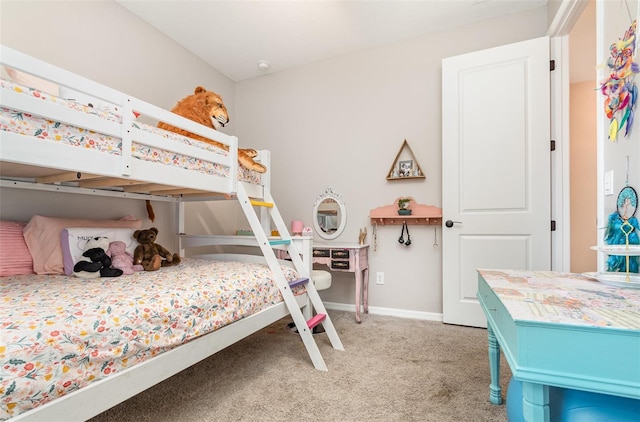 bedroom featuring carpet flooring and baseboards