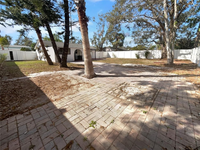 913 27th St E, Bradenton, FL 34208 - fenced backyard with a patio