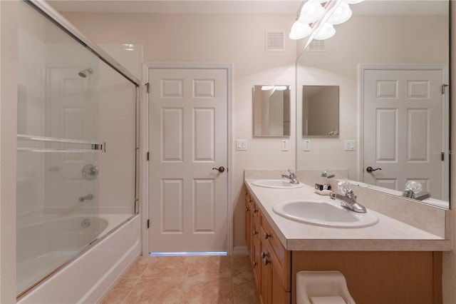 8168 Boat Hook Loop Unit 707, Windermere, FL 34786 - bathroom with bath / shower combo with glass door, double vanity, and tile patterned flooring