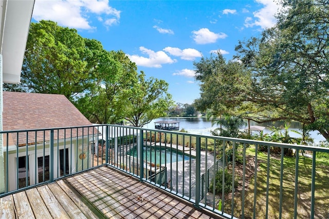 balcony featuring a water view