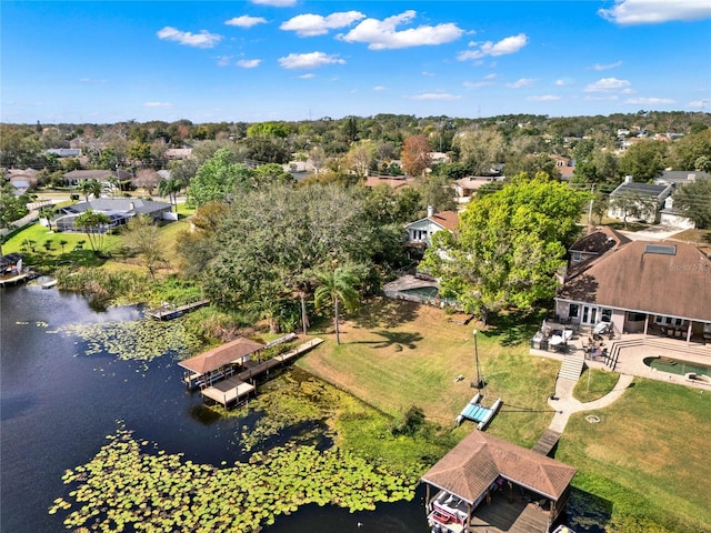 aerial view with a residential view and a water view