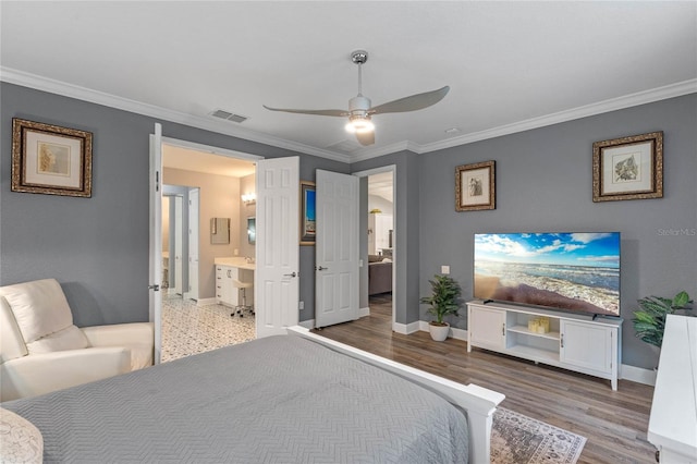 bedroom featuring light wood-type flooring, visible vents, and ornamental molding