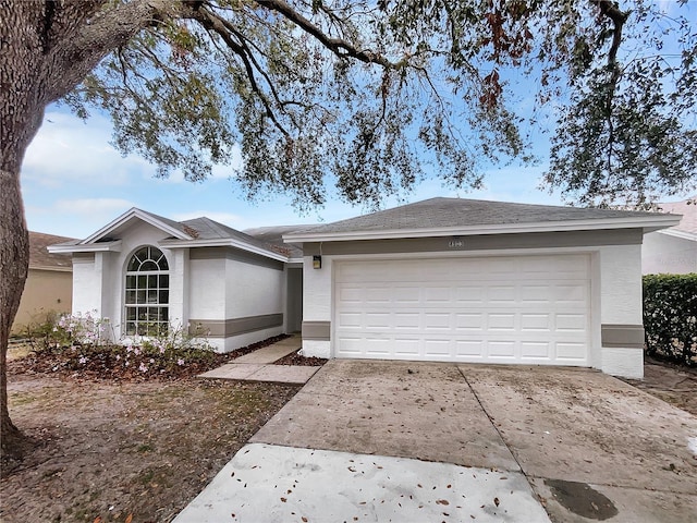 ranch-style house featuring a garage