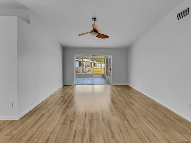 unfurnished living room with ceiling fan and light hardwood / wood-style floors