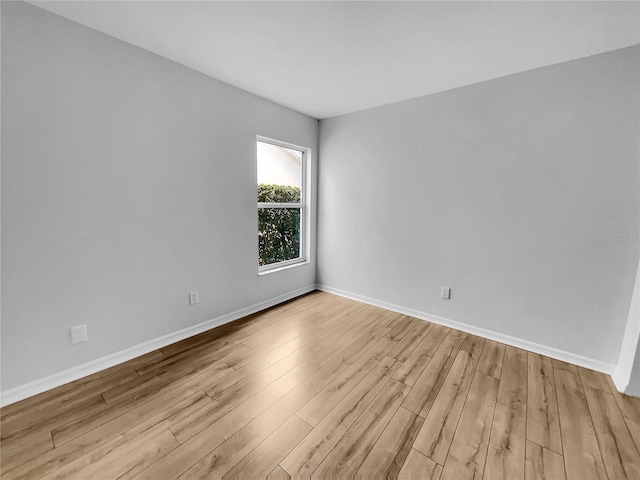 empty room featuring light hardwood / wood-style floors