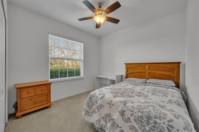 15506 Gemini Dr, Mascotte, FL 34753 - bedroom featuring light colored carpet and ceiling fan