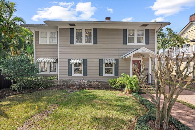 view of front facade featuring a front yard