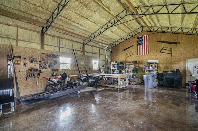 garage with a workshop area