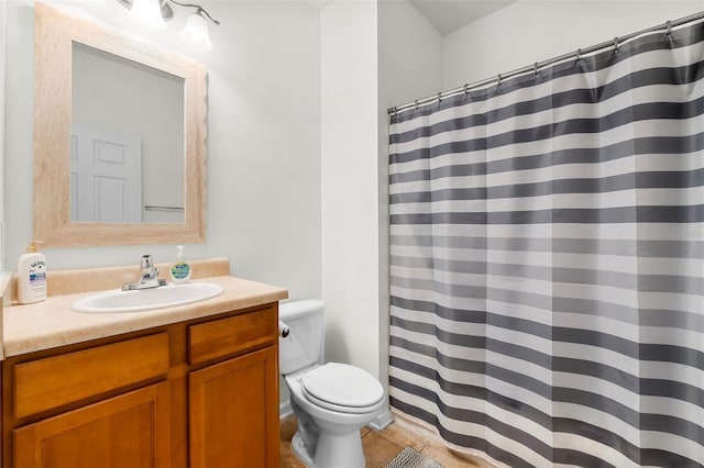 231 Turtle Cv, Panama City Beach, FL 32413 - bathroom with a shower with shower curtain, vanity, toilet, and tile patterned flooring