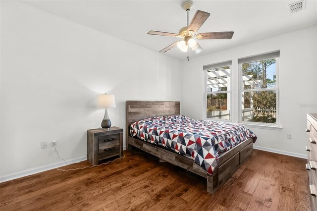 231 Turtle Cv, Panama City Beach, FL 32413 - bedroom featuring ceiling fan and dark hardwood / wood-style flooring