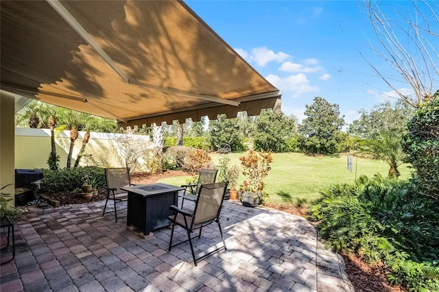 view of patio / terrace featuring a fire pit