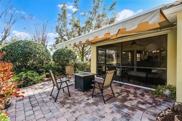 view of patio / terrace featuring a fire pit