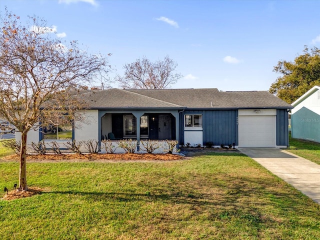 ranch-style home with a garage and a front lawn