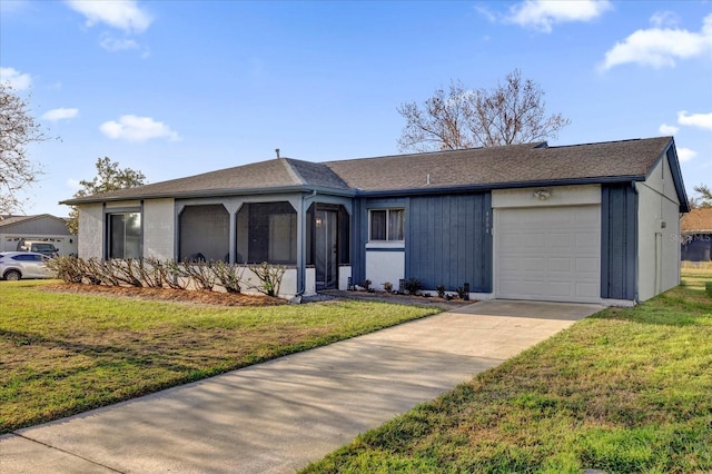 single story home with a garage and a front yard