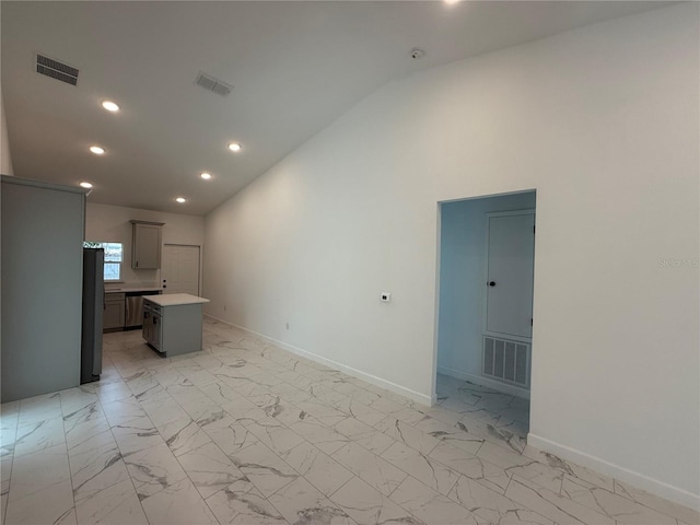 interior space featuring high vaulted ceiling