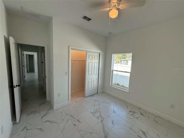 unfurnished bedroom with a closet and ceiling fan