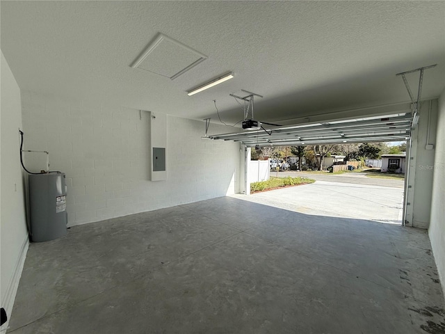 garage featuring a garage door opener, electric panel, and water heater