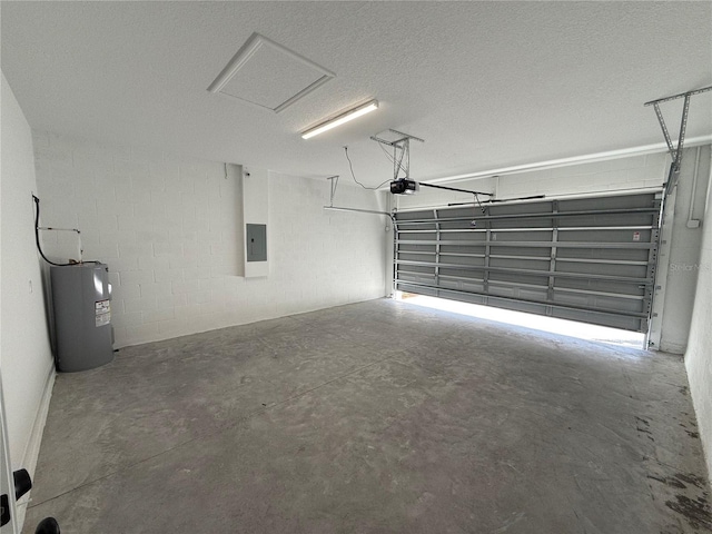 garage featuring water heater, a garage door opener, and electric panel