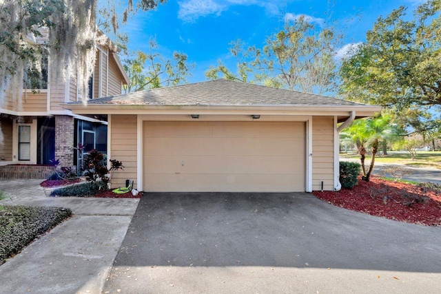 exterior space with a garage