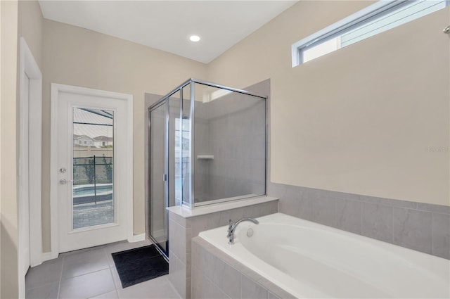 bathroom featuring tile patterned floors and plus walk in shower