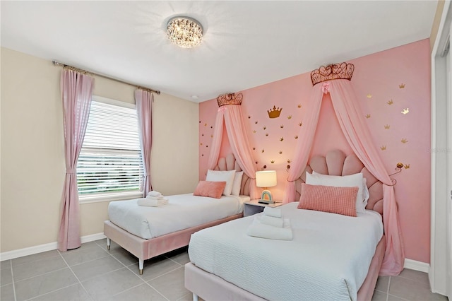 bedroom featuring light tile patterned floors