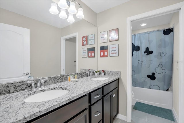 full bathroom with vanity, a notable chandelier, toilet, shower / bathtub combination with curtain, and tile patterned floors