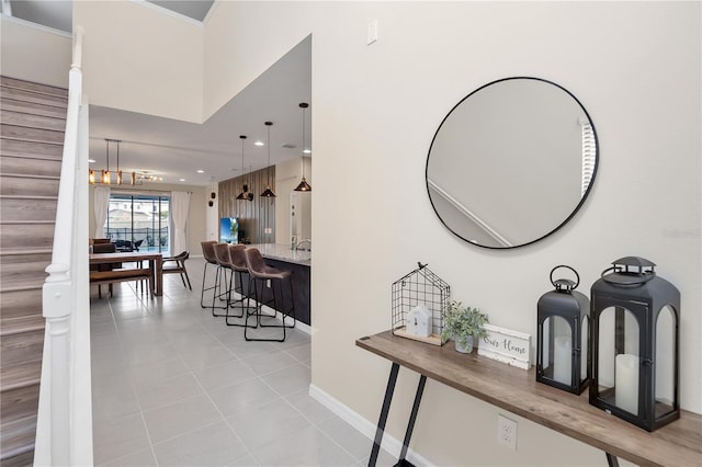 hallway featuring light tile patterned flooring