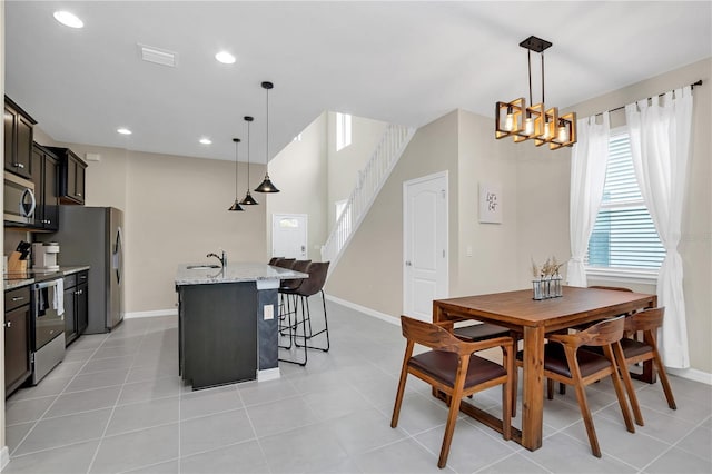 tiled dining area with sink