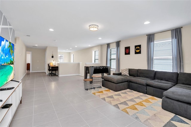 living room with light tile patterned floors