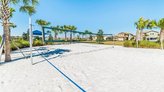 view of home's community with volleyball court