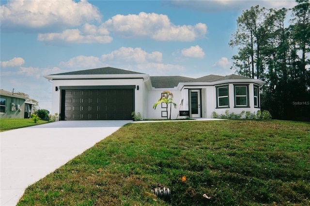 view of front facade featuring a garage and a front lawn