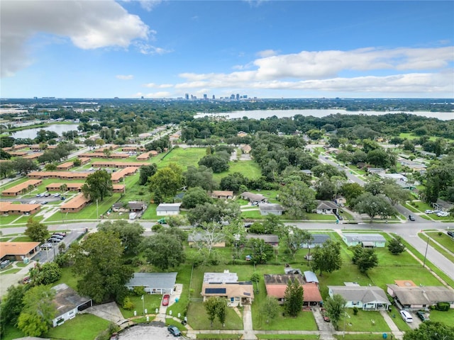 drone / aerial view with a water view