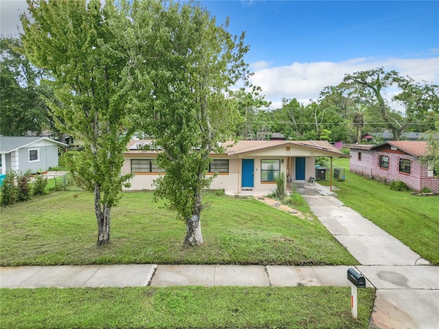 single story home featuring a front yard