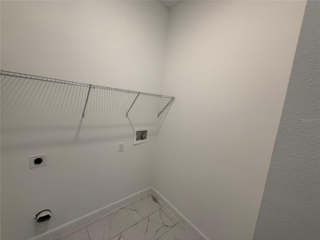 clothes washing area with hookup for an electric dryer and washer hookup