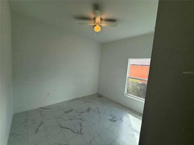 unfurnished room featuring ceiling fan