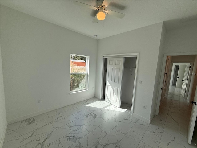 unfurnished bedroom featuring a closet and ceiling fan