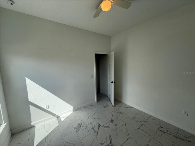 empty room with ceiling fan