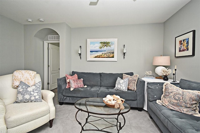 living room with light tile patterned floors