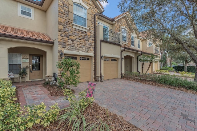 view of front of property with a garage