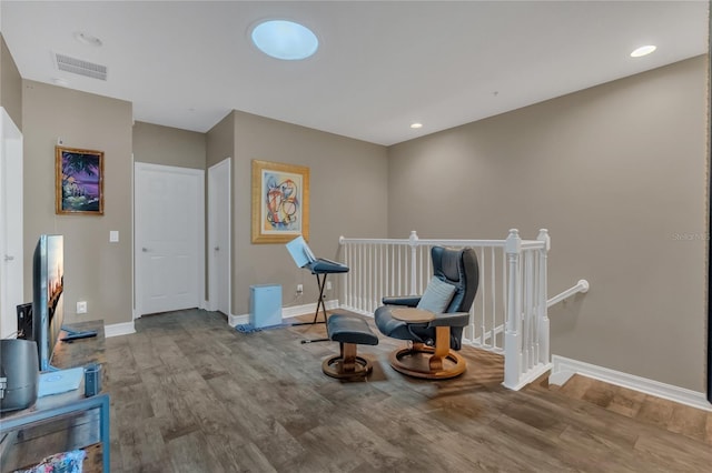 sitting room with light wood-type flooring