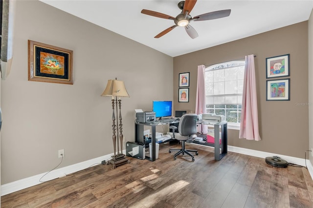 office with hardwood / wood-style flooring and ceiling fan